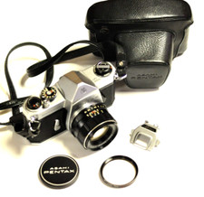 Pentax Spotmatic SP 35mm with a 55mm f1.8 lens  acc. READ.