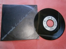 Genesis - Invisible Touch / The Last Domino 7...