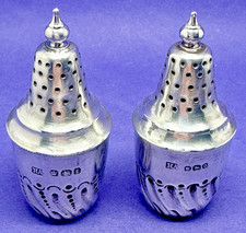 PAIR OF VICTORIAN SOLID SILVER REPOUSSE PEPPER POTS BY ATKIN BROS. ASSAYED 1896
