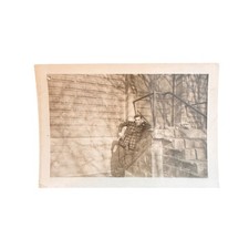 1945 WWII Era Snapshot Soldier Resting on Steps Vintage Military Photo Original