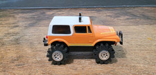 1980's Schaper Stomper Orange Jeep Renegade 4x4--Runs and Lights Up 