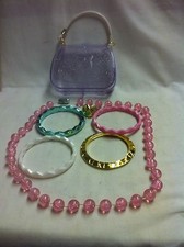Four bracelets a Necklace and a Purse