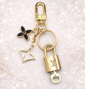 Authentic Louis Vuitton Lock & Key with Unbranded Flower Charm, Keychain