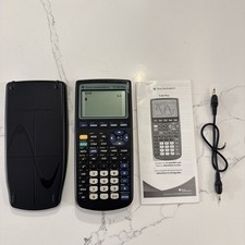 Texas Instruments TI-83 Plus Graphing Calculator cord and book  working 