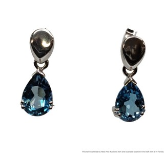 Orecchini goccia topazio blu svizzero a forma di pera oro bianco 14 carati mai indossati donna moda