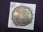 1881-P Morgan Dollar in with UNC details with small scratches # 3