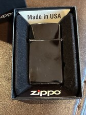 New Zippo Lighter Black Ebony Slim Unfired Made In USA