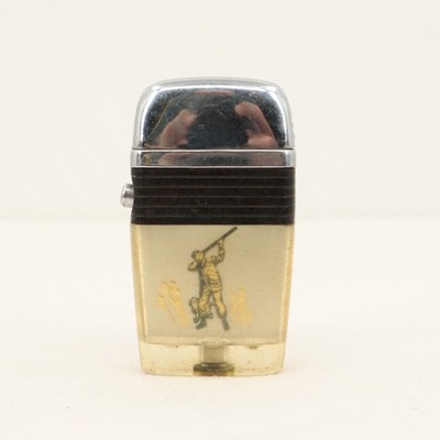 Vintage Scripto VU Lighter Depicting a Man and Dog Hunting