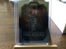 2022-23 Prizm Basketball Trae Young Fireworks Insert #21