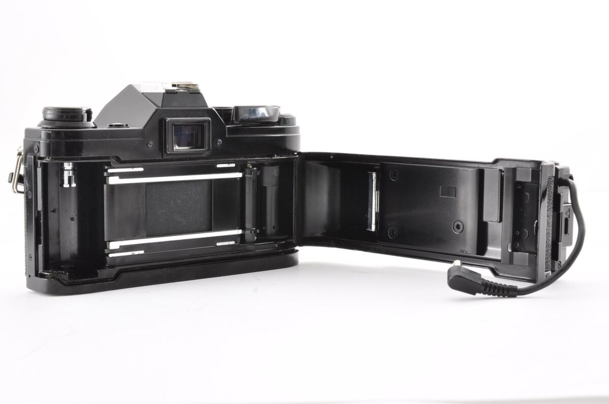 Canon AE-1 Black / New FD 35-70mm f/3.5-4.5 Excellent+ SLR Canon AE-1 Black / New FD 35-70mm f/3.5-4.5 Excellent+ SLR