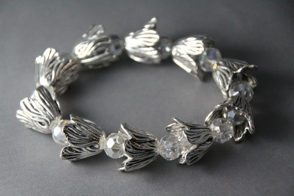 Pulsera elástica cristal flor peltre plata brote facetado cristal transparente talla 6,5 Foto 2 de 4