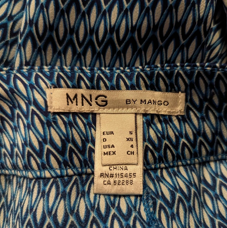 Pantalones semi transparentes 1976 nuevos con etiquetas MNG By Mango talla 4 100 % poliéster azul estampado diamante Foto 2 de 4