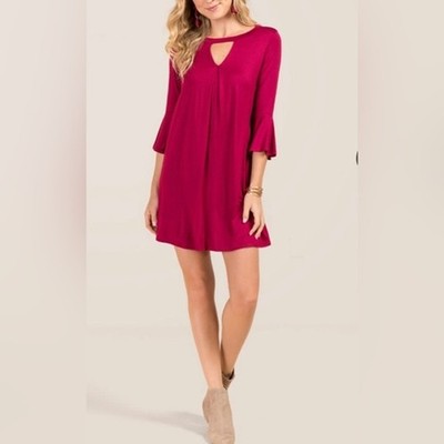 Francesca s Alya Wine dress with bell sleeves size small