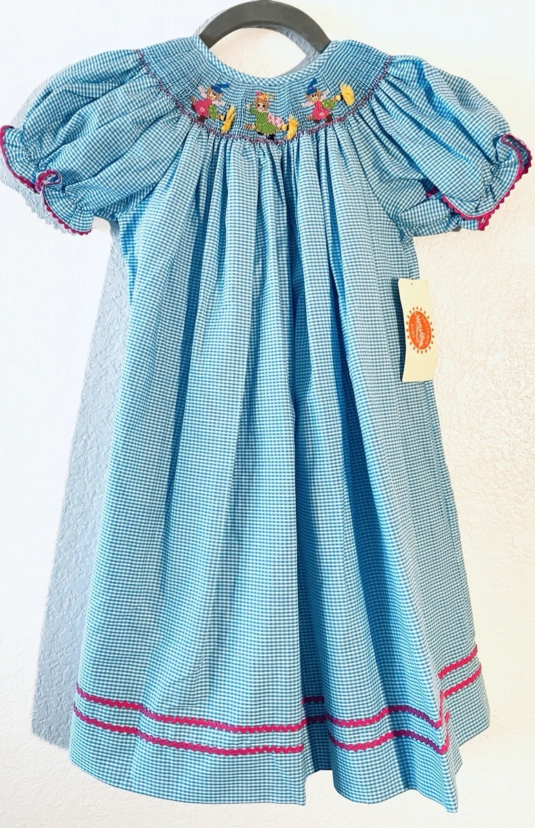 green emerald velvet dress Cecelia Smocked Mock Neck Dress – Allie and Me Boutique main image 1