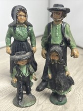 Antique 4 pc set Amish Family Cast Iron Figures Vintage Collectable Toys