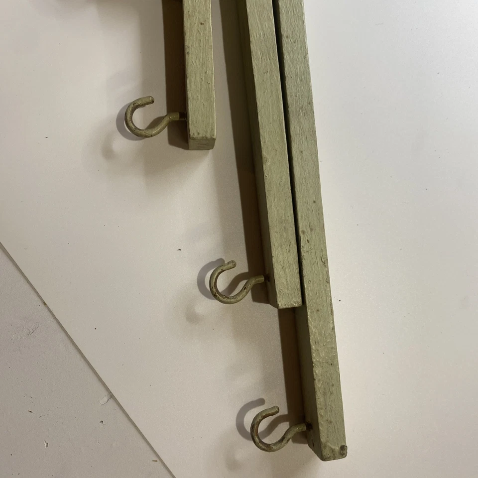 Holdsmore Antique Wood and Metal Folding Rack with 5 Hanger Arms and Hooks, 1921 - Image 3 of 4