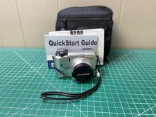 OLYMPUS CAMEDIA C-740 ULTRA ZOOM WITH 16MB SD CARD/ BLACK SAMSONITE BAG.