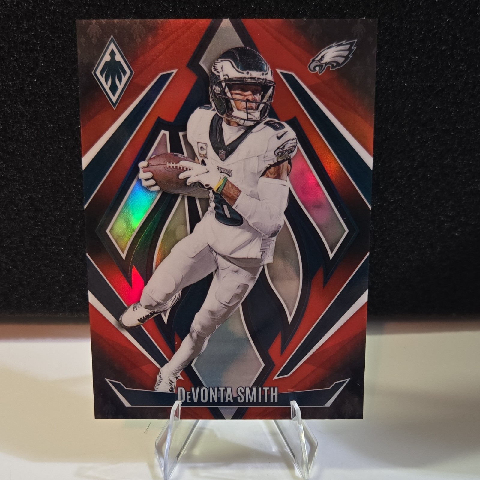 2024 Panini Phoenix DeVonta Smith #48 Red Fade /299 Philadelphia Eagles NFL