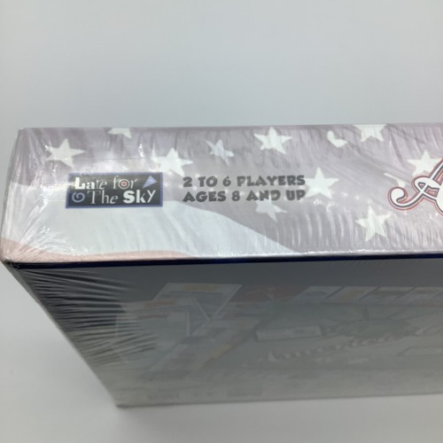 White America-Opoly box with blue star border, red logo, and text “2 to 6 players Ages 8 and up” on side.