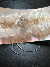 NEW WEDDING GARTER, FROM LOCAL WEDDING SHOP, NOW CLOSED. MANY LISTED. GRY-99-40