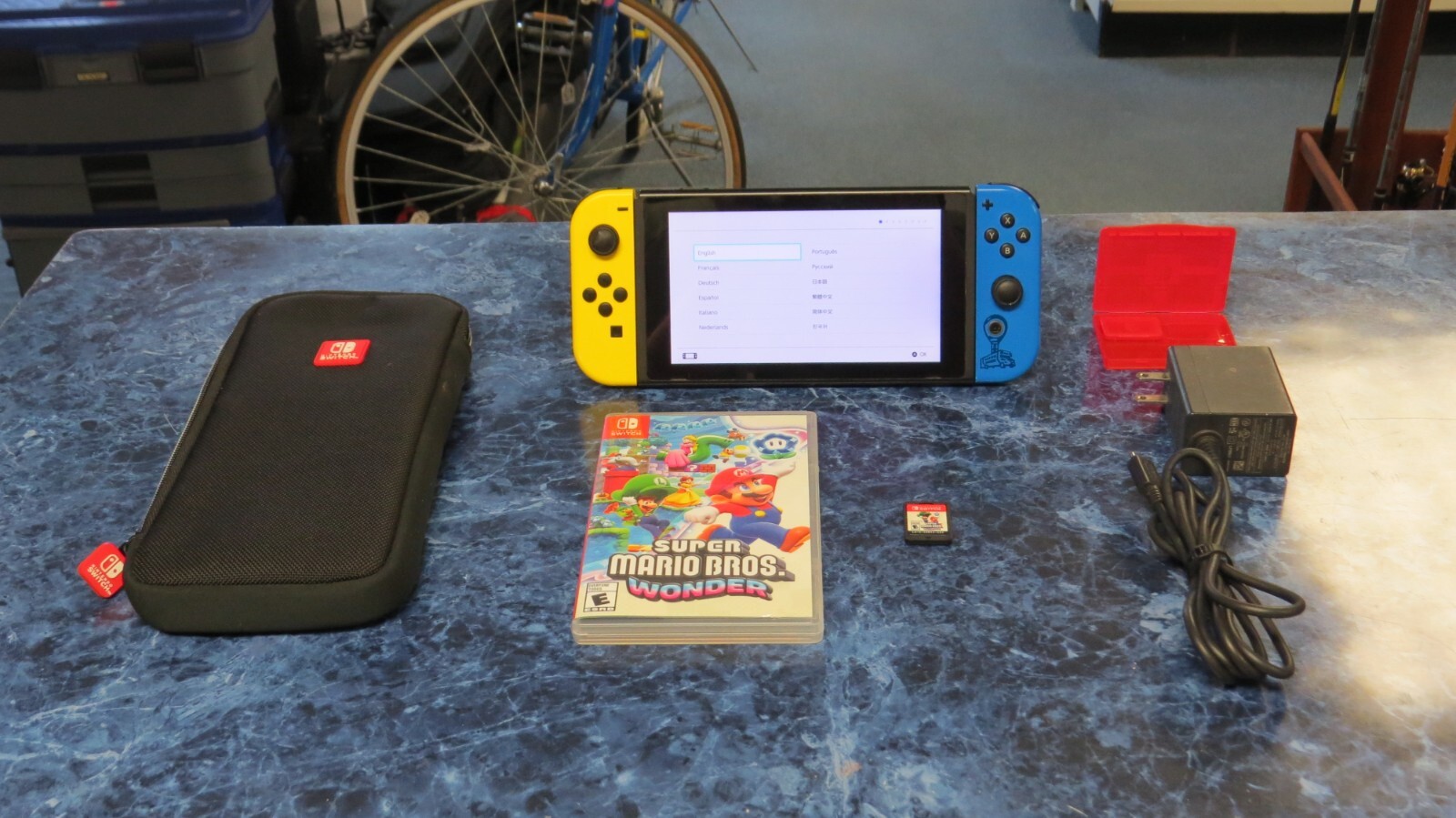 Nintendo Switch Fortnite Wildcat Edition with Mario Bros Wonder and Soft case-image