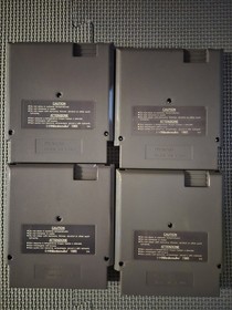 Nintendo NES game lot (Bugs Bunny Blowout, Top Gun, Cobra Triangle,  Mario 2)