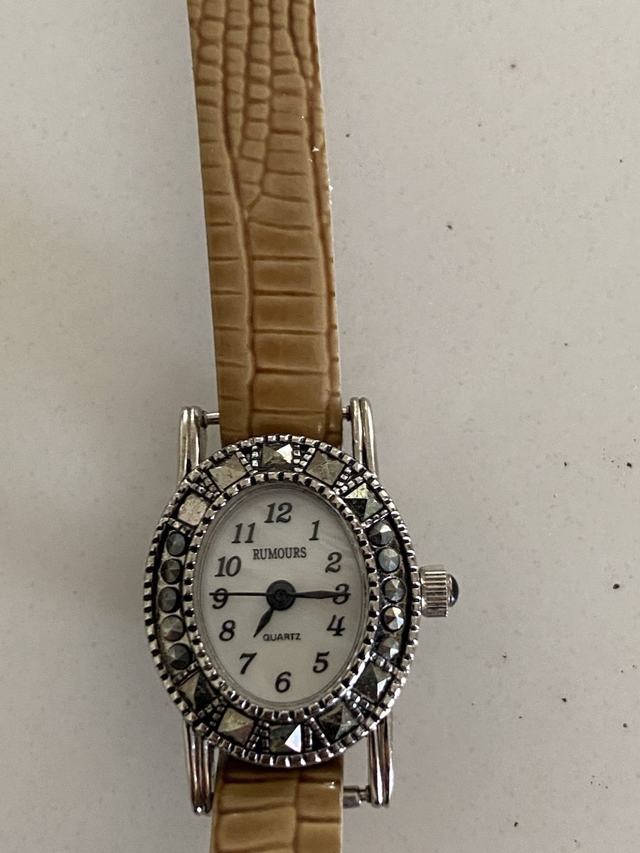 Rumours women's wrist watch featuring a silver-tone oval case Working Great View 2