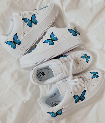 white nike butterfly shoes