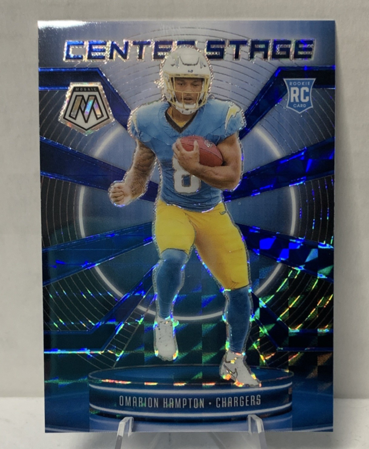 2025 Panini Mosaic Center Stage Omarion Hampton Blue Prizm #6 Chargers /99 RC