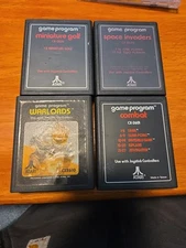 Lot Of Four Atari Game Programs Space Invaders Combat Warlords Miniature Golf...