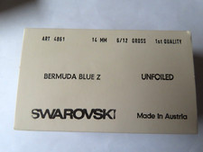 4 Swarovski 3/4 Flatback Disco Balls in 14mm Bermuda Blue. 4861