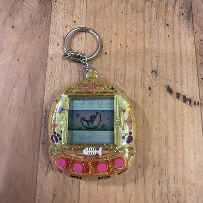 Giga Pets Tiger Electronics Virtual Pet Keychain Yellow Tested & Working Retro