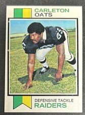 1973 Topps Carleton Oats Football Rookie Card (RC) #127 Raiders DT PR White Dots. rookie card picture