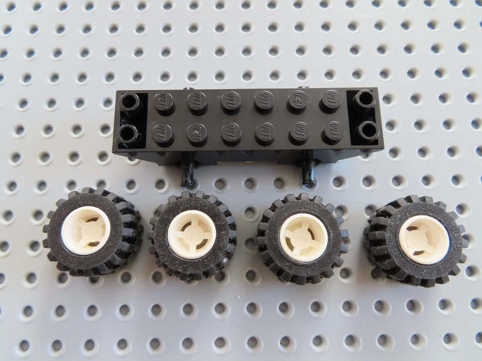 Lego 1 x Fahrgestell 30277 schwarz 2x8 + 4 Reifen Felge weiß 6014ac01 - Bild 1 von 1