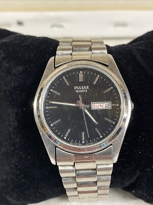 #ad Vtg Pulsar Watch Men V533 8C70 Black Dial Day Date stainless Band New Battery $20.99