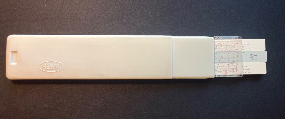 A Teledyne Post Hemmi slide rule made in Japan — the premium import brand favored by serious engineers in the 1960s-70s, still in its case.