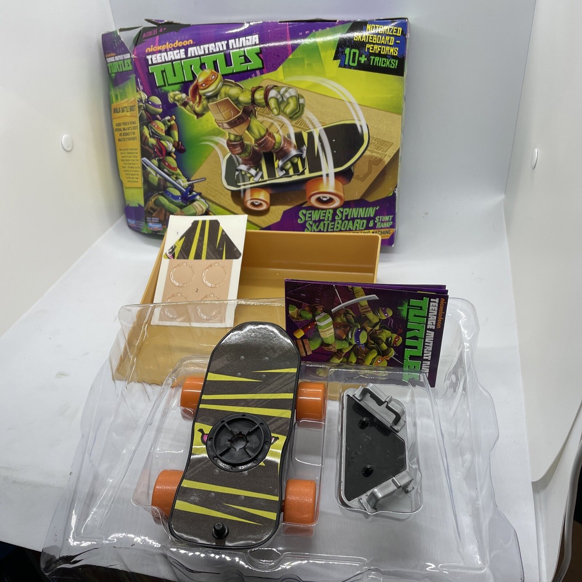 PLAYMATES TEENAGE MUTANT NINJA TURTLES SEWER SPINNING SKATEBOARD