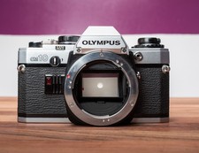 Olympus OM10 SLR Vintage Film Camera 35mm Body W/Case Tested Working PLU:G4