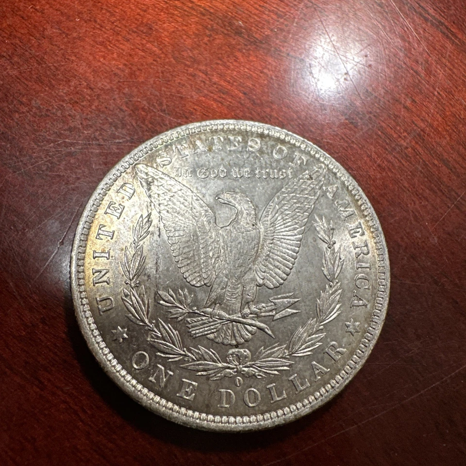Dólar de plata Morgan 1884 en buen estado circulado. Nueva Orleans como nuevo Foto 3 de 4