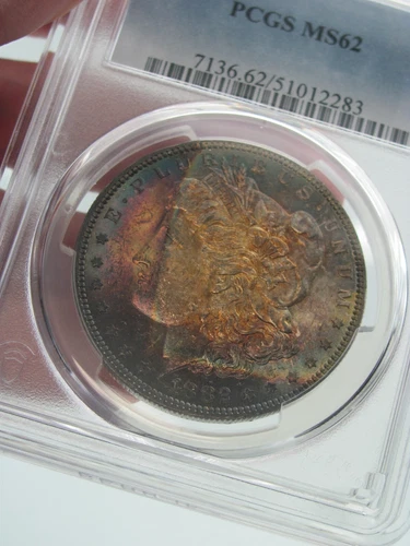 1882-O Morgan Silver Dollar PCGS MS 62 End of Roll Rainbow Toning