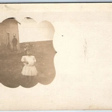 c1910s Cute Confused Little Girl Outdoors RPPC Farm House Child Alyda Photo A259