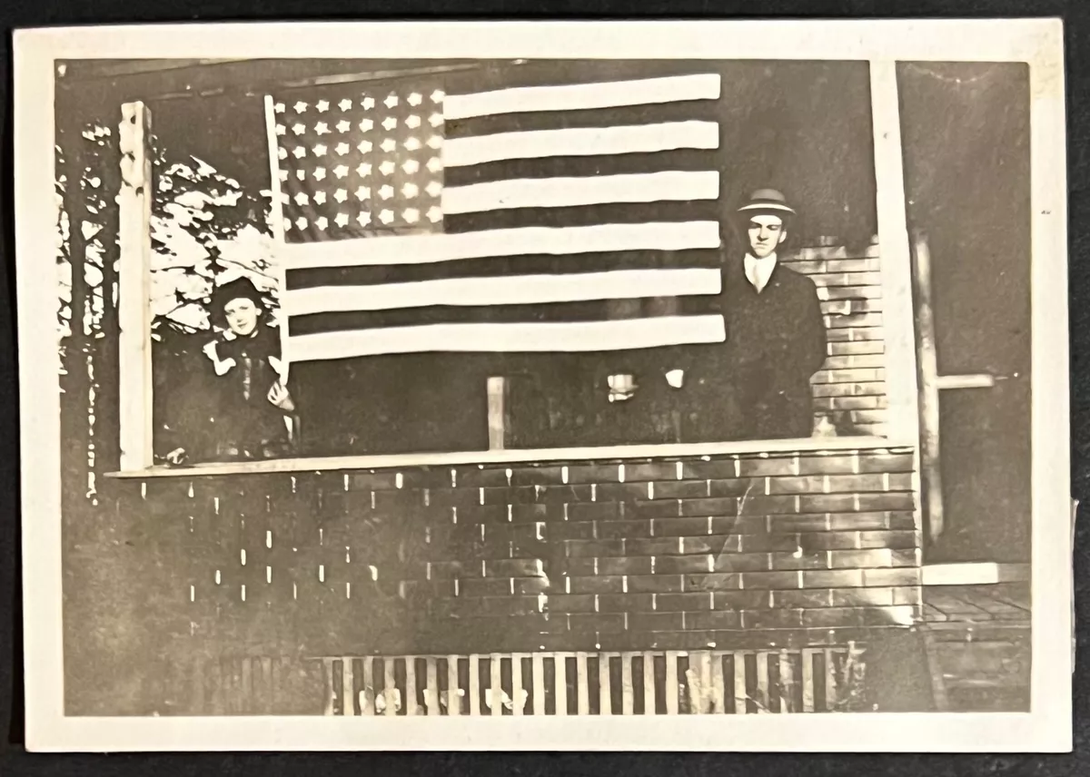 Snapshot 1917 American Flag hanging on front porch | eBay