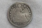 1857 Liberty Seated Half Dime in Poor Condition due ding/bend