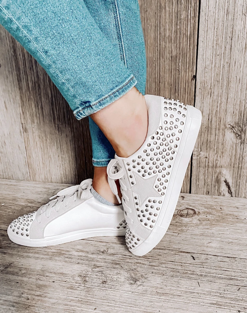 Tenis blancos con estrellas sale