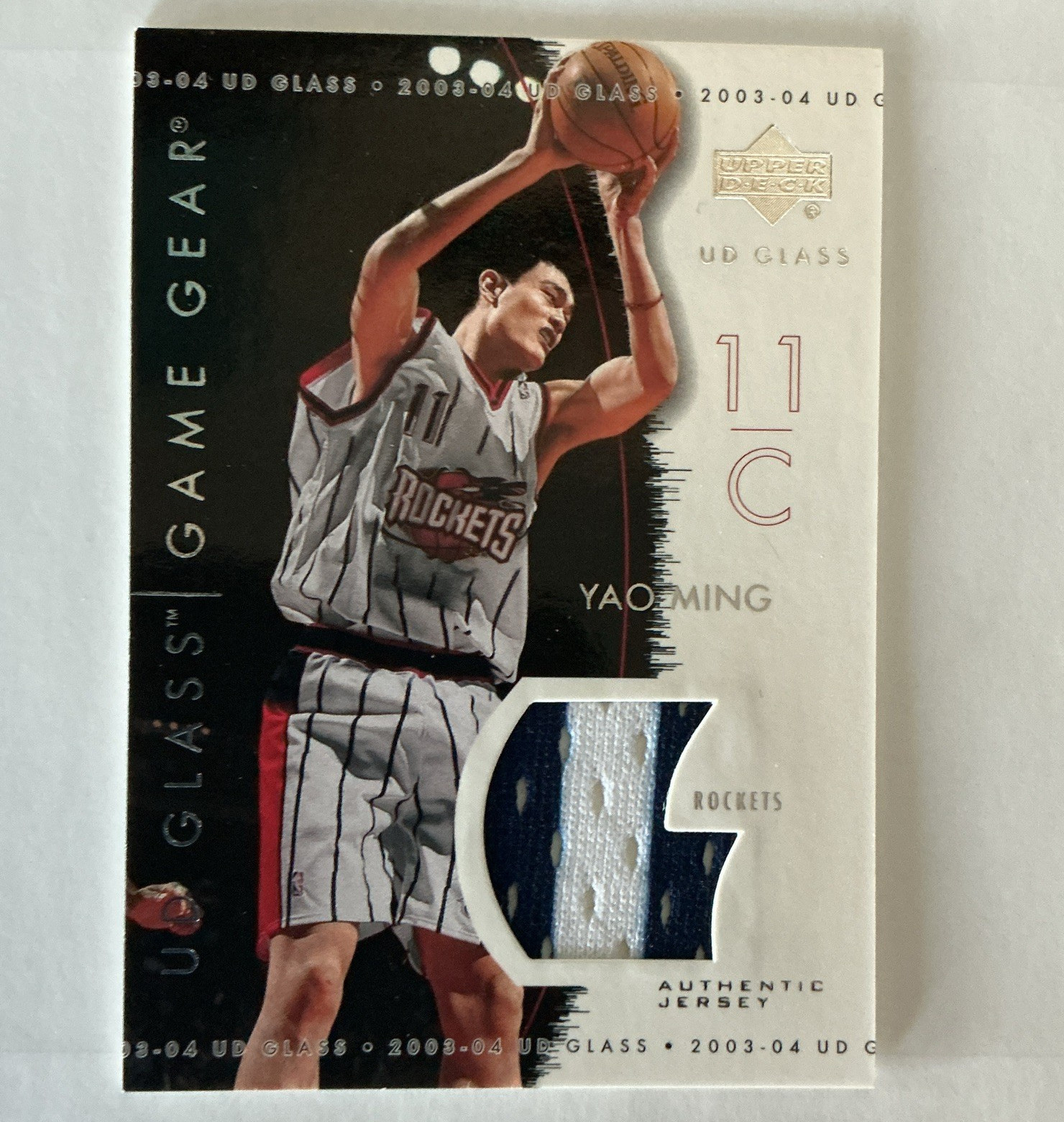 Upper Deck UD Glass 2003-04 Game Gear Jerseys Insert #GG-YM Yao Ming Rockets