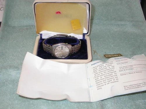 Vintage Seiko 6106-8089 Day Date stainless wrist watch w/original box and receip