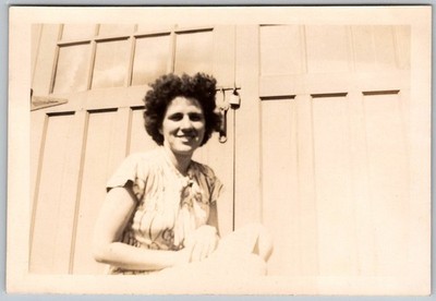 Vtg B&W Snapshot Smiling Woman Curly Hair Patterned Dress Barn Door 1940s