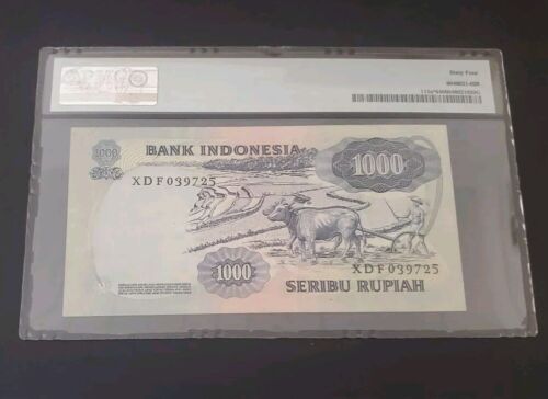 INDONESIA 1000 RUPIAH 1975 P#113a* Replacement/star 🌟 PMG 64 Choice UNC - Picture 2 of 2