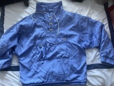 Etirel jasnoniebieska wyściełana kurtka narciarska wiatrówka rozmiar XL, 2 przednie kieszenie unisex 