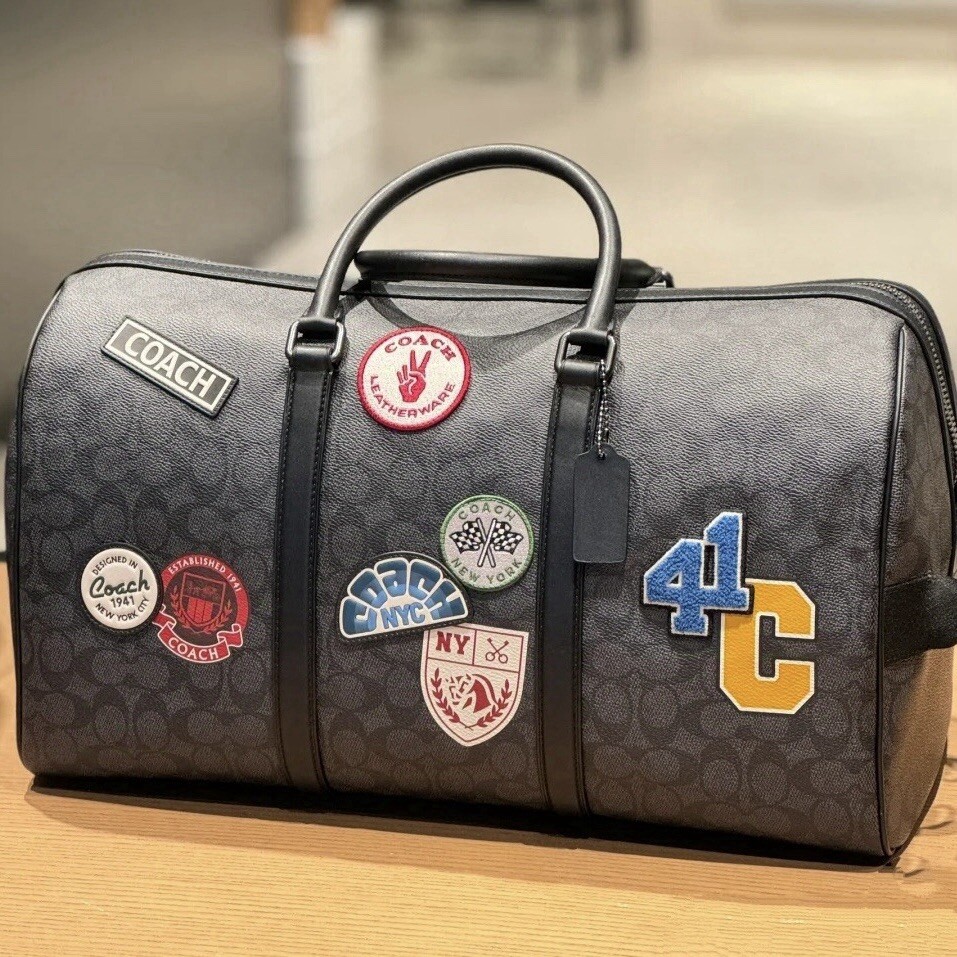 Ski Patches Trekker Bag In Signature Canvas With Travel Patches